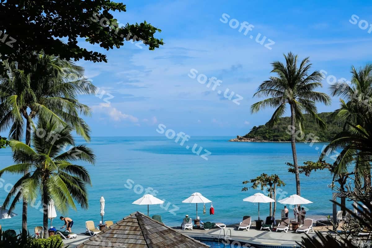 Manzilatli peshqon ko'k osmon orqali | Scenic view beach against blue sky 1