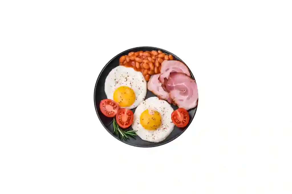 Qovurilgan tuxum pomidor, bekon loviya quyuq beton fon bilan mazali to'yimli ingliz nonushta | Delicious nutritious english breakfast with fried eggs tomatoes bacon beans dark concrete background