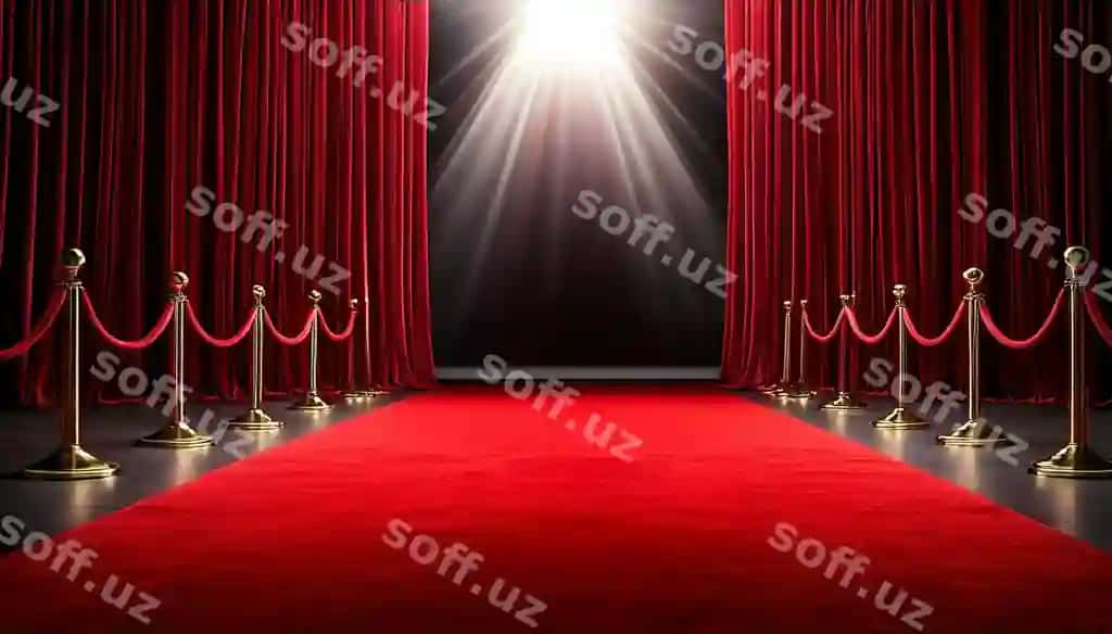 Rasm klassik qizil mezbonlik kelishigi sahnasi, velyut pardalar oʻrab turgan spotlight yorqinligida stseniyani namoyish etadi. | Image depicts classic red carpet scene with velvet curtains framing spotlightlit stage