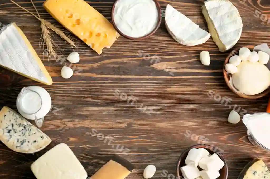 Yangi sut mahsulotlari yong‘oq orqa fonda | Fresh dairy products wooden background