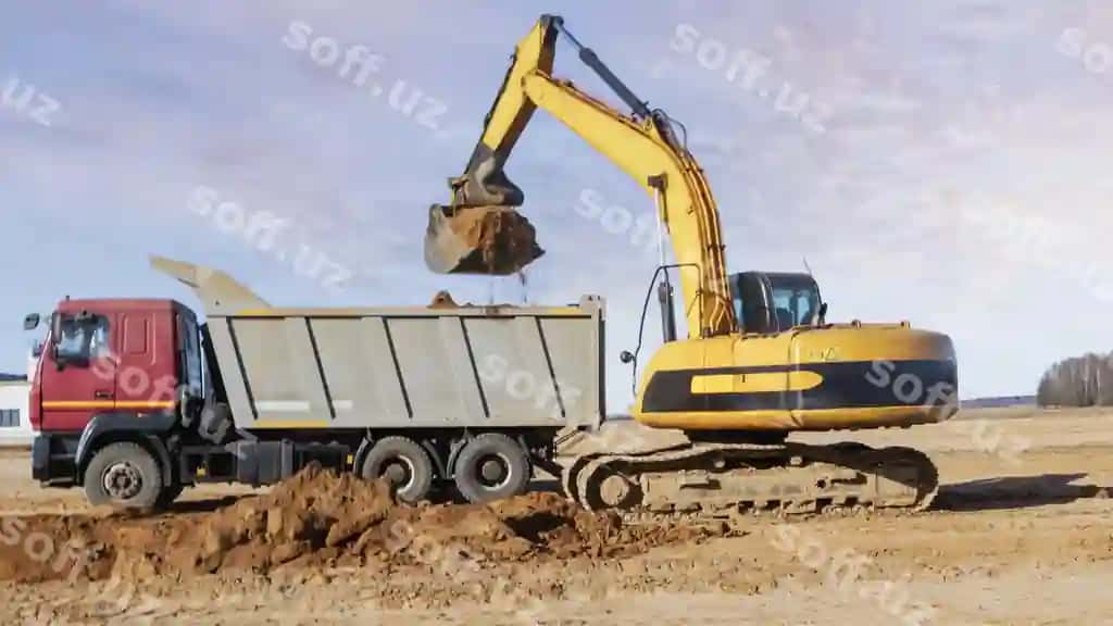 Kuchli krawatli ekskavator ko'k asman fonida bino qurish joyidan olib chiqiladigan xoharni dump truck ga yuklaydi. | Powerful crawler excavator loads earth into dump truck against blue sky development removal soil from construction site